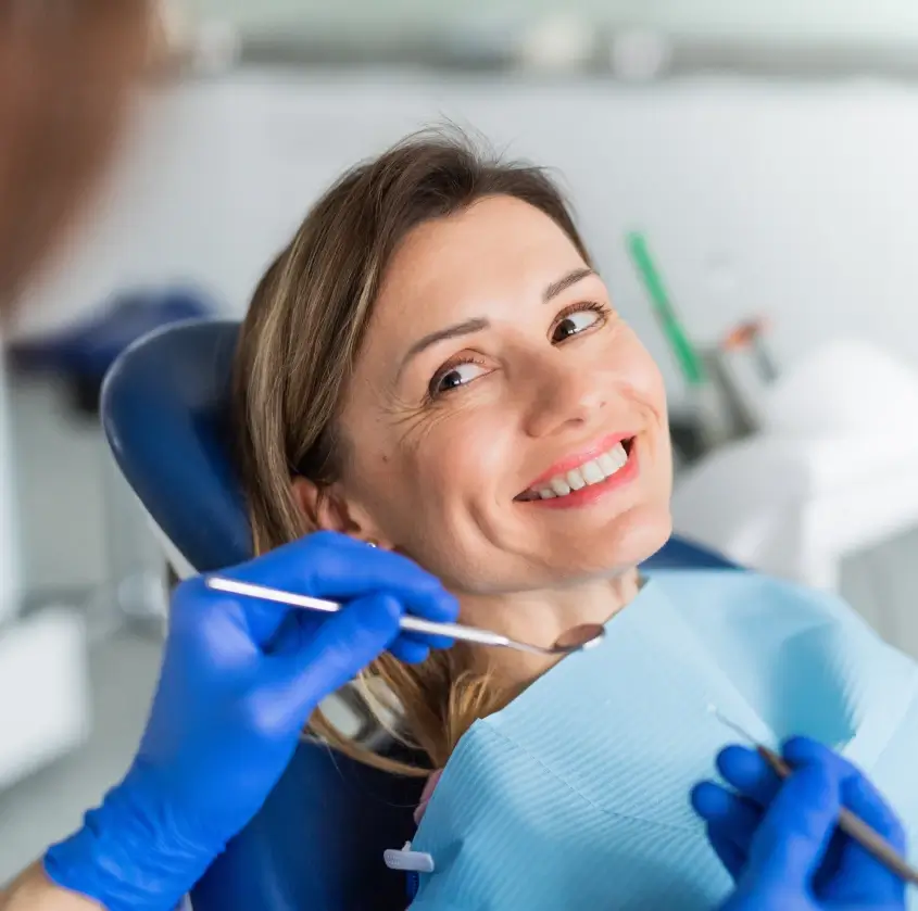 A smiling patient confident in her restored smile