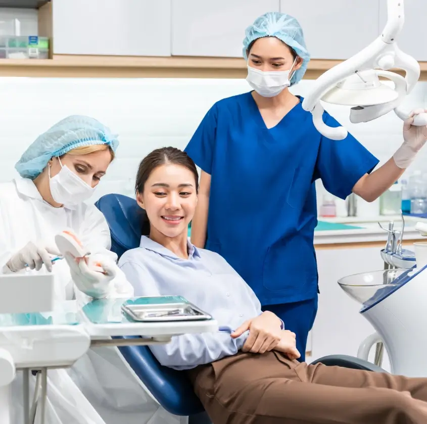 A smiling patient relaxed in the dental chair