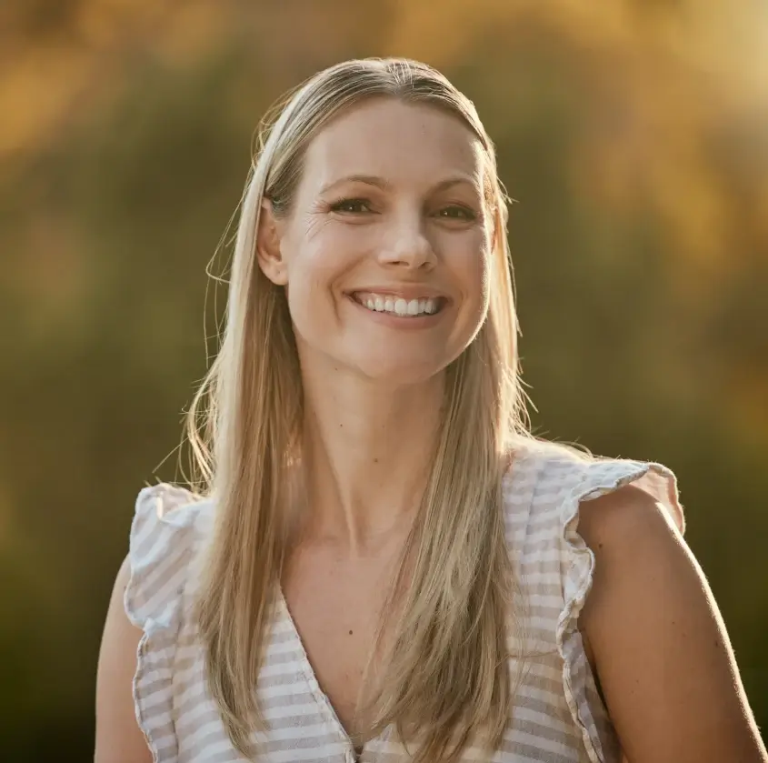 A smiling mid-age patient